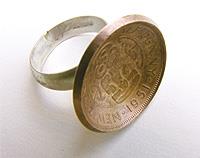 Half penny ring set with silver